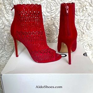 Also size 7.5 red laser cut heeled booties